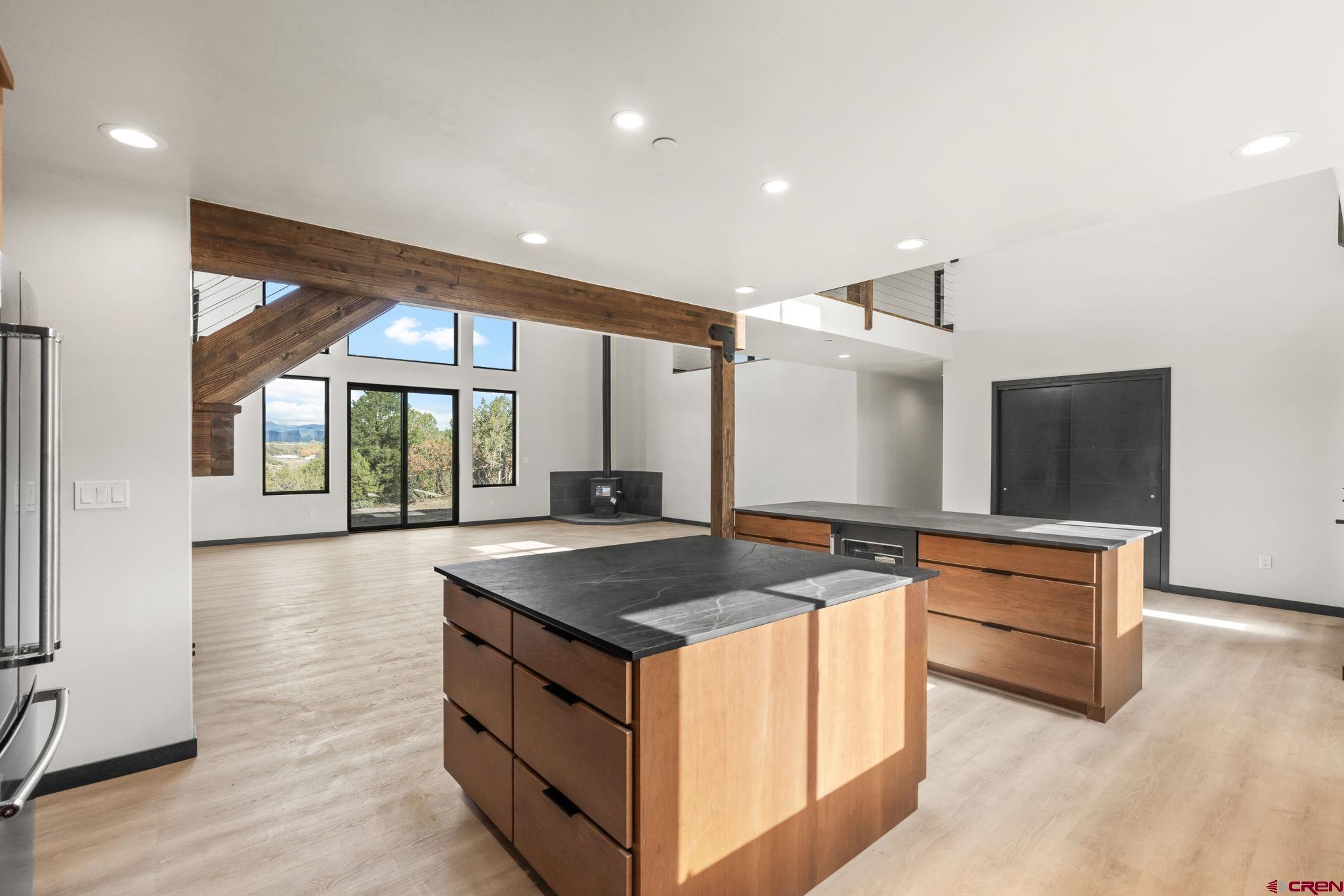 192 Rawhide Road Durango, CO 81303 - Photo 6 of 41 a kitchen that has a sink and a stove in it