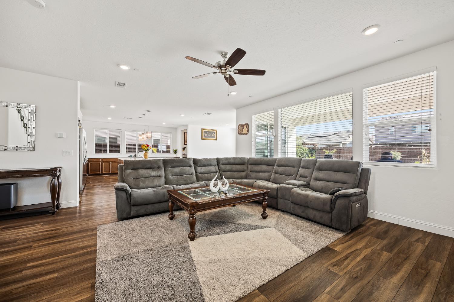 153 Boulder Drive Madera, CA 93636 - Photo 20 of 32 a living room with furniture and a large window