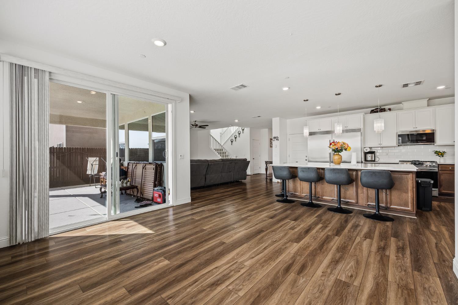 153 Boulder Drive Madera, CA 93636 - Photo 24 of 32 a living room with furniture and a table