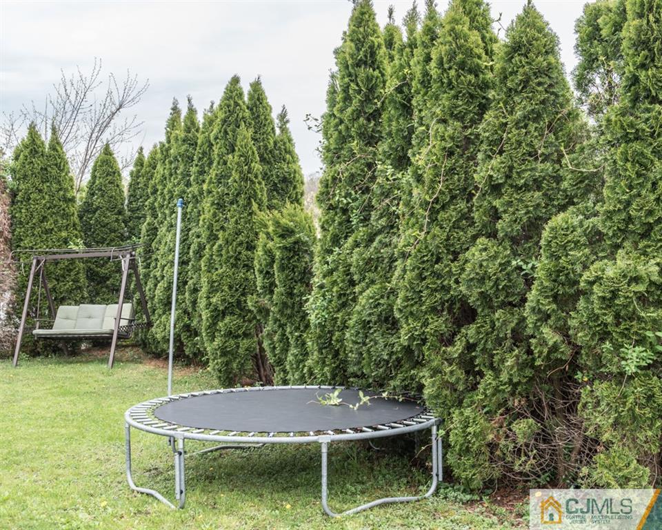 29 Mercer Road Old Bridge, NJ 08857 - Photo 22 of 24 a patio with table and chairs
