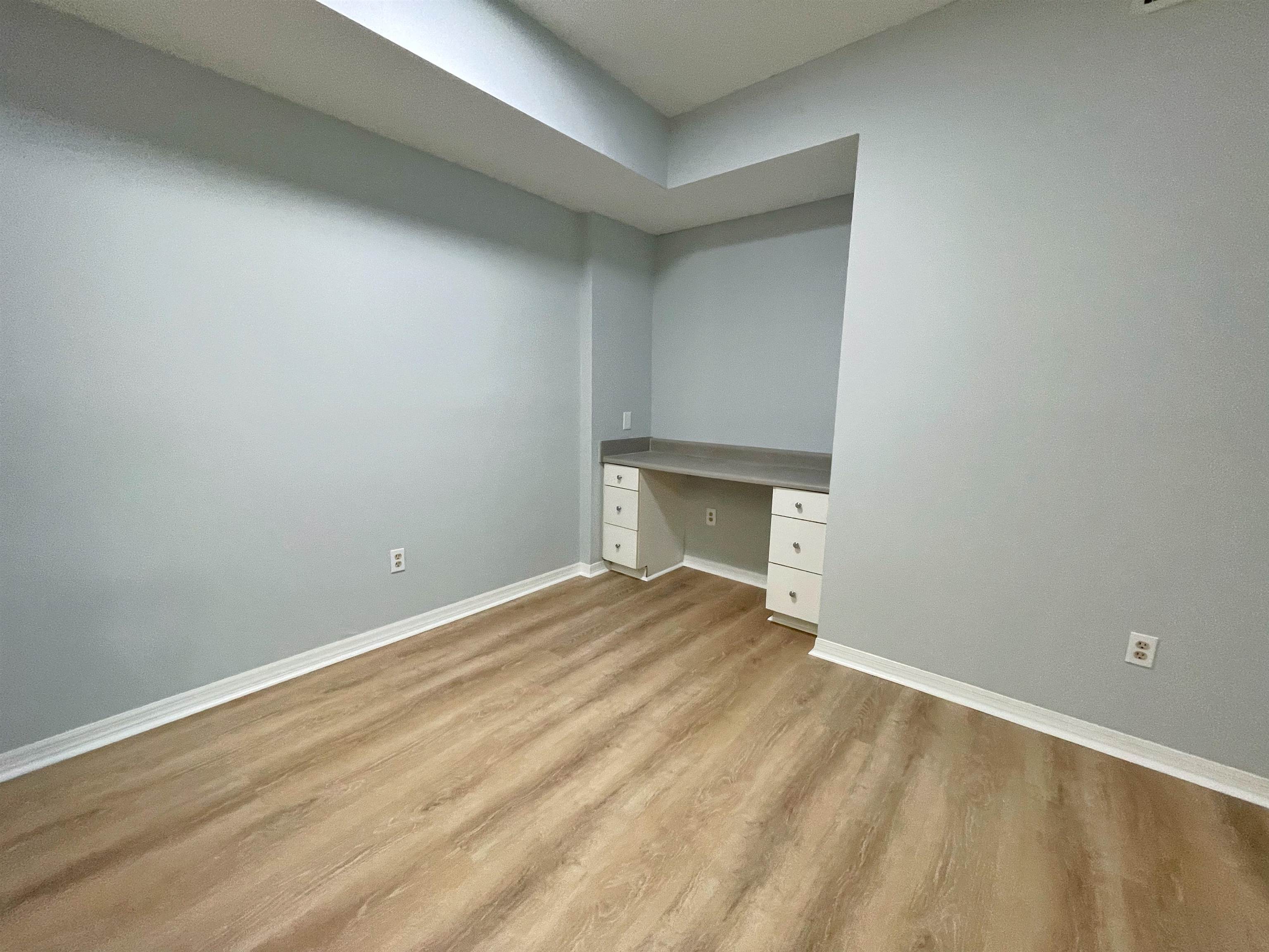 17-101 Harbour Vista Circle St. Augustine, FL 32080 - Photo 12 of 29 a view of an empty room with wooden floor and a fireplace