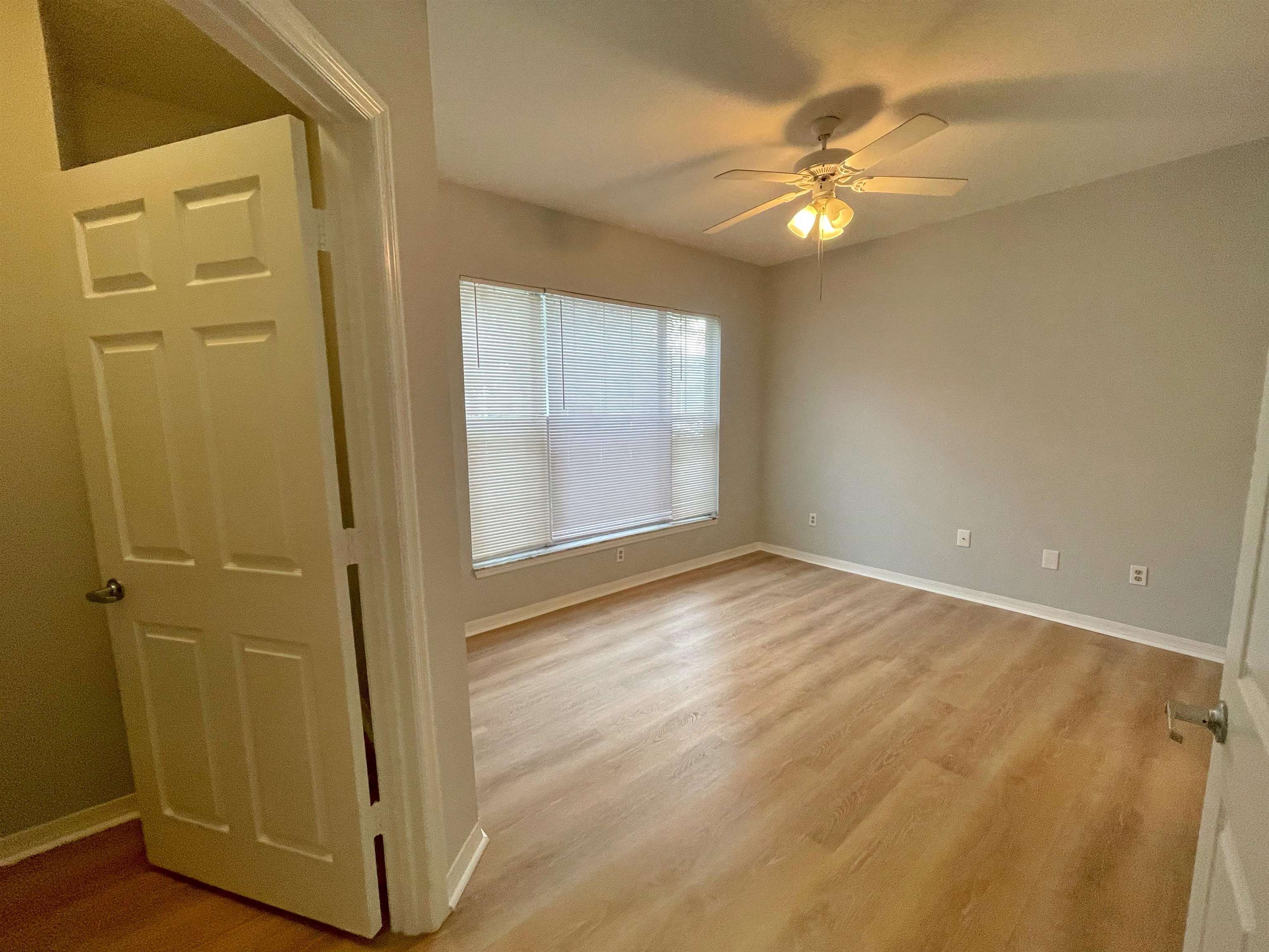 17-101 Harbour Vista Circle St. Augustine, FL 32080 - Photo 19 of 29 a view of an empty room with wooden floor and a window