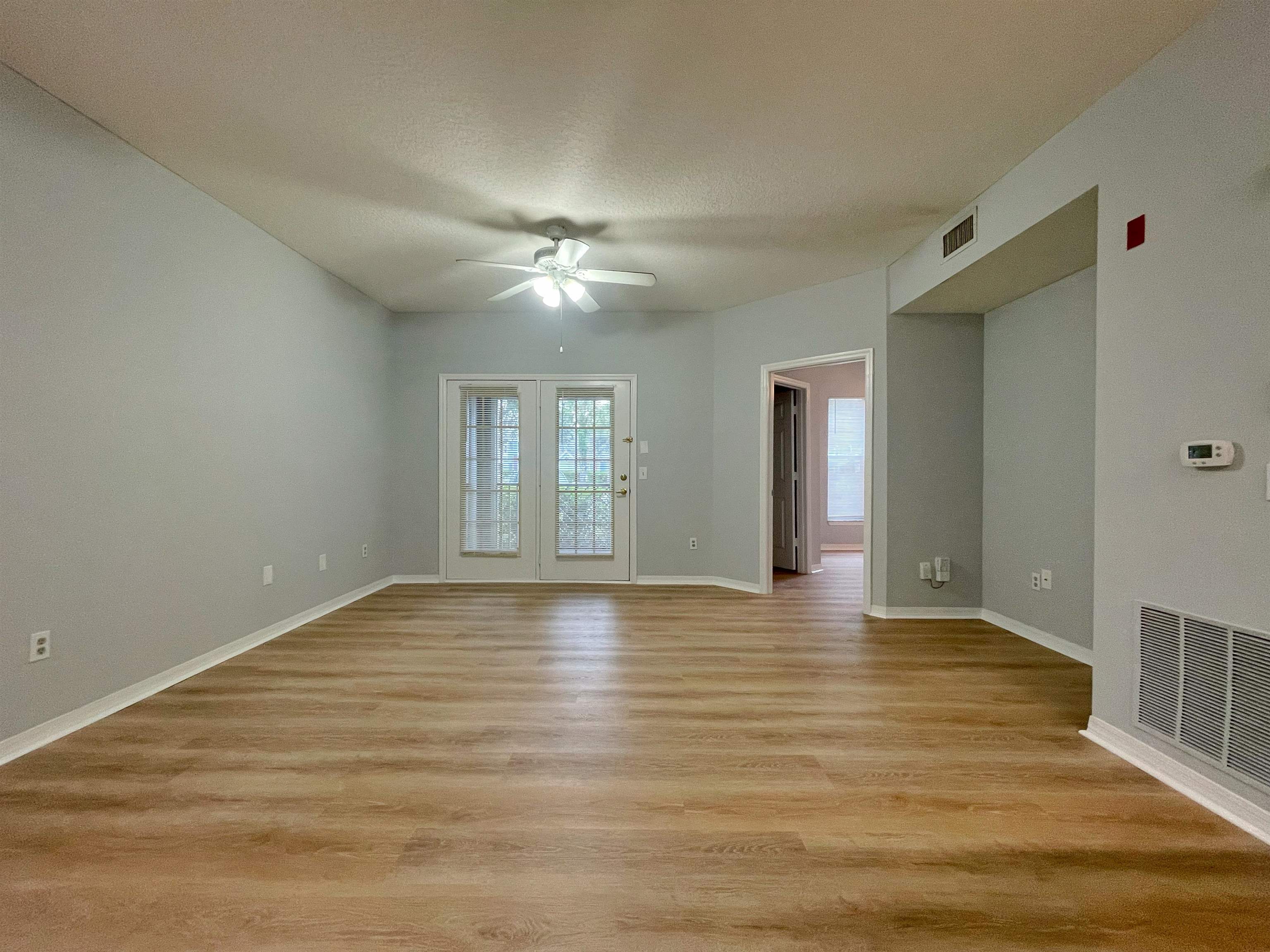 17-101 Harbour Vista Circle St. Augustine, FL 32080 - Photo 10 of 29 a view of an empty room with window and wooden floor