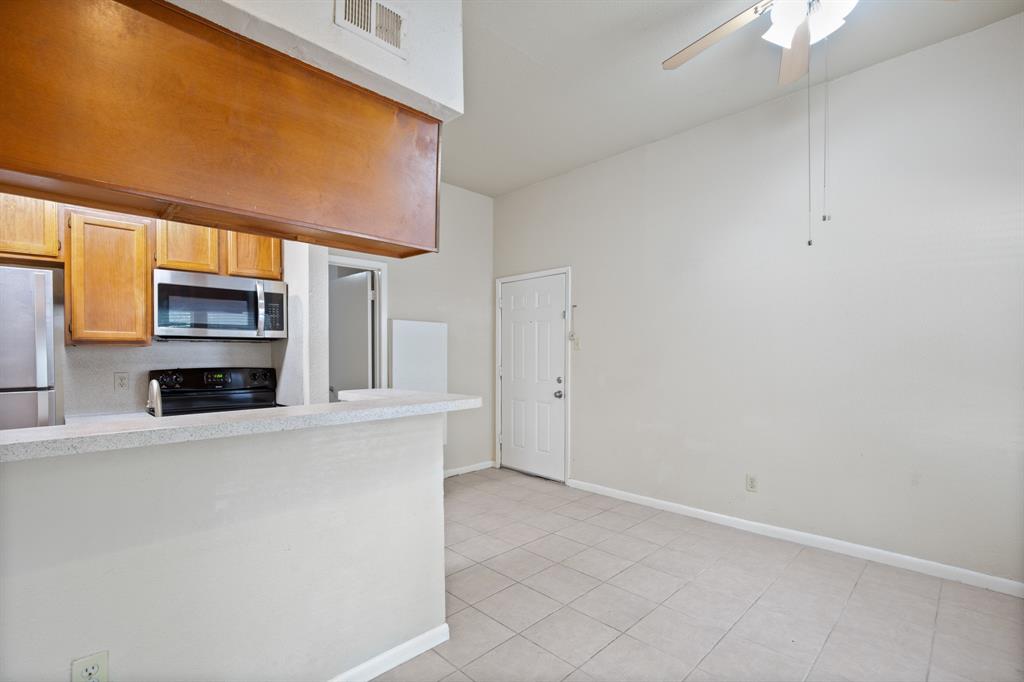 2311 Nueces Street, Unit 101 Austin, TX 78705 - Photo 5 of 6 a view of a kitchen with an oven