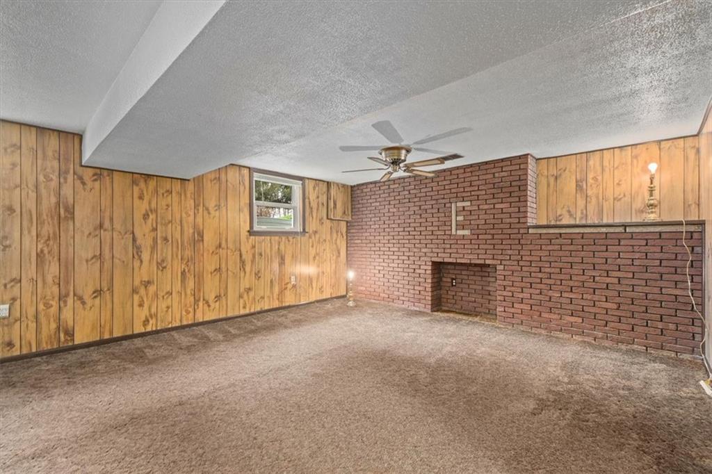 158 McConnell Road McDonald, PA 15057 - Photo 16 of 24 a view of an empty room with a fireplace