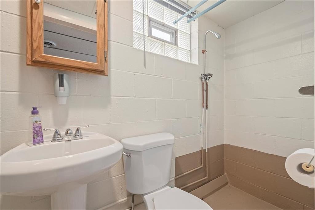158 McConnell Road McDonald, PA 15057 - Photo 18 of 24 a bathroom with a sink a toilet and shower