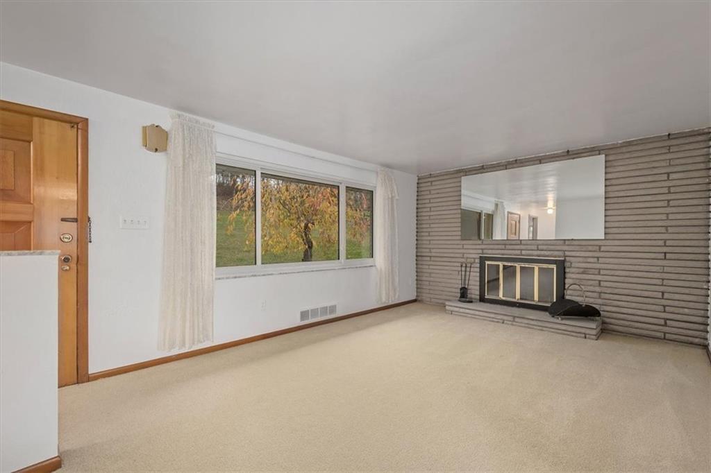 158 McConnell Road McDonald, PA 15057 - Photo 5 of 24 a view of an empty room with a window