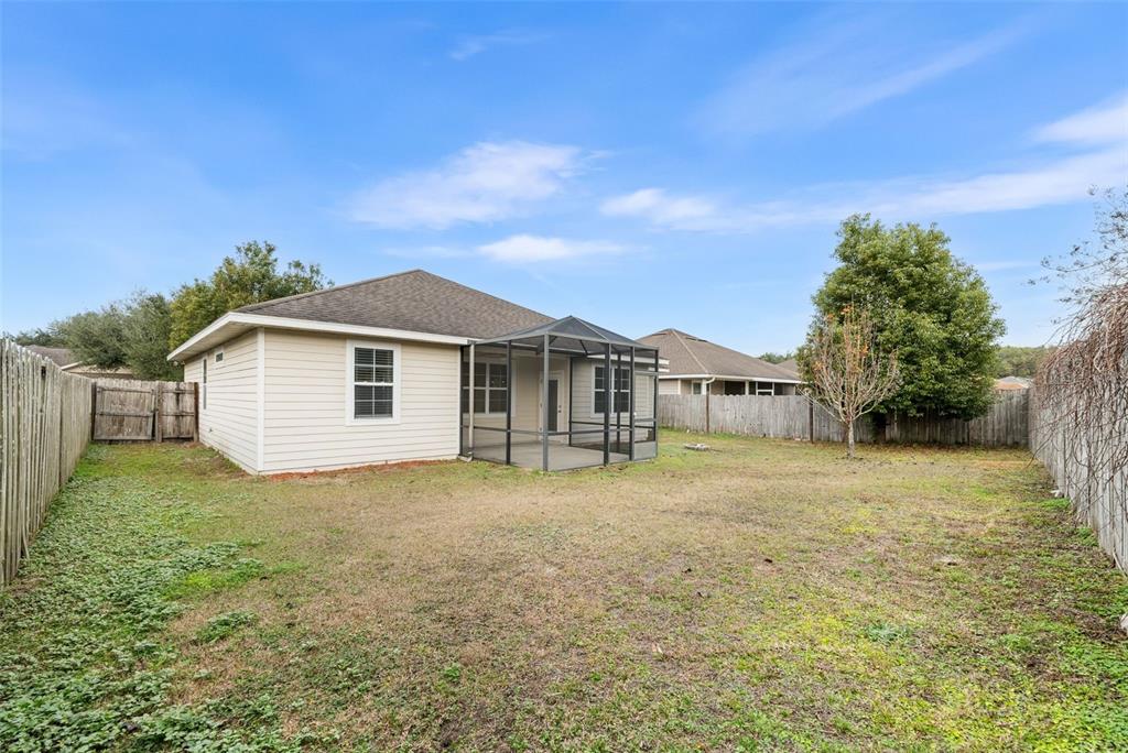 16617 Northwest 194th Street High Springs, FL 32643 - Photo 32 of 32 a front view of a house with a yard
