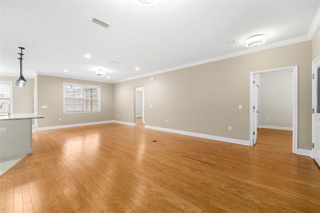 16617 Northwest 194th Street High Springs, FL 32643 - Photo 7 of 32 a view of an empty room with window and wooden floor