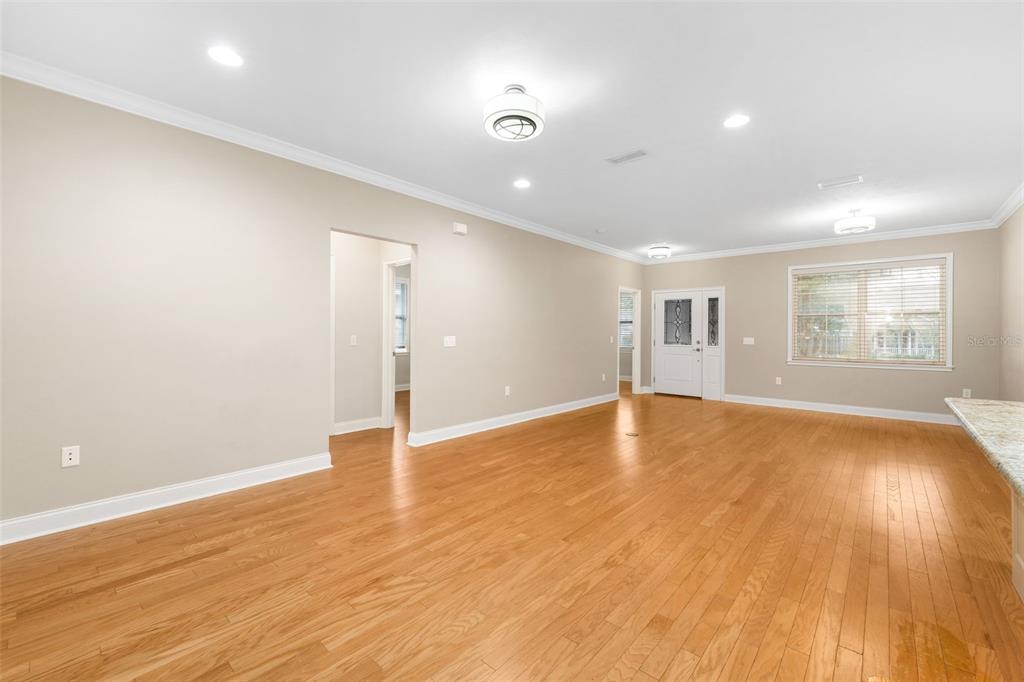 16617 Northwest 194th Street High Springs, FL 32643 - Photo 8 of 32 a view of empty room with wooden floor and fan