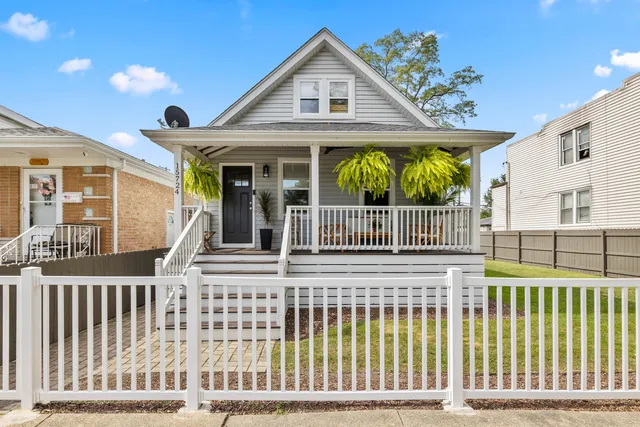 a front view of a house with a porch