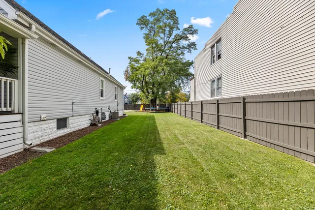 a view of a backyard with a garden