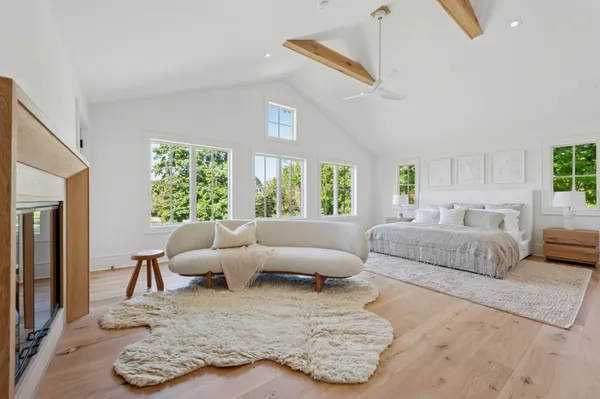 a living room with furniture window and a lamp