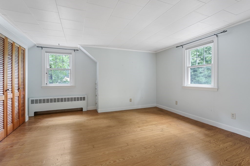 21 Cutler Drive Ashland, MA 01721 - Photo 16 of 34 an empty room with windows