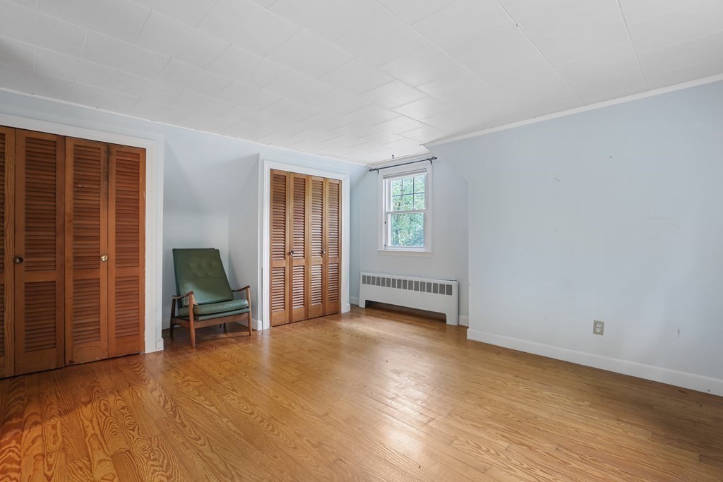 21 Cutler Drive Ashland, MA 01721 - Photo 17 of 34 an empty room with windows closet and windows