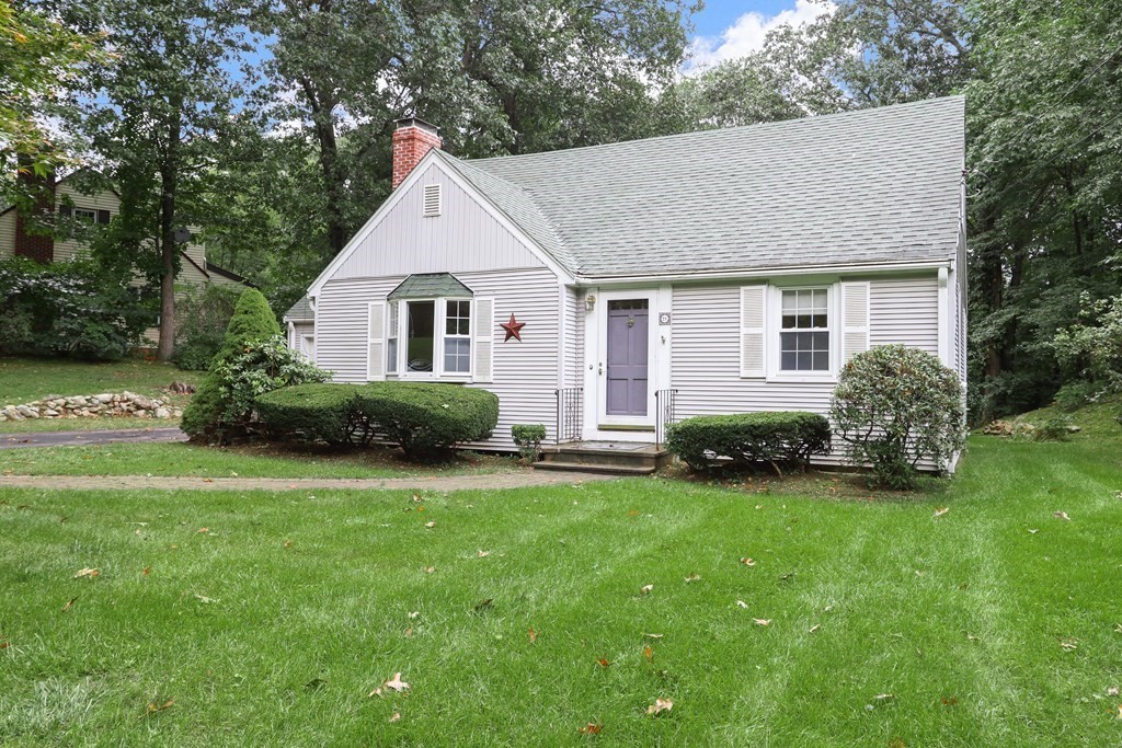 21 Cutler Drive Ashland, MA 01721 - Photo 2 of 34 a front view of house with yard and green space