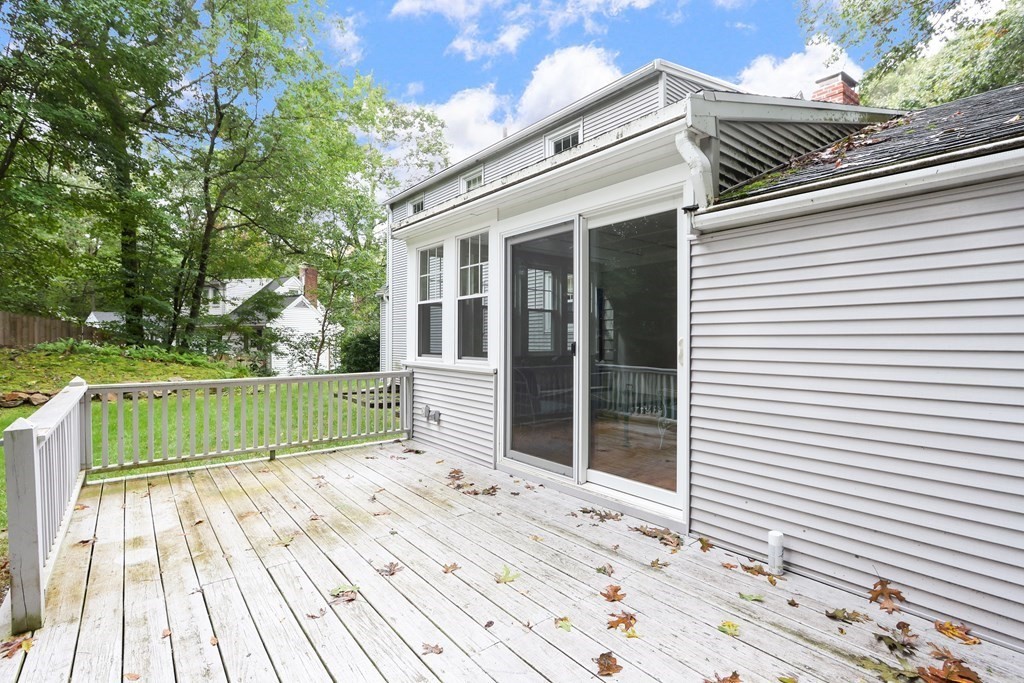 21 Cutler Drive Ashland, MA 01721 - Photo 27 of 34 a view of a deck with a large window