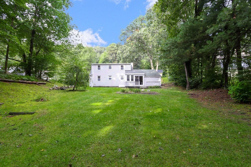 21 Cutler Drive Ashland, MA 01721 - Photo 33 of 34 a view of a house with a yard