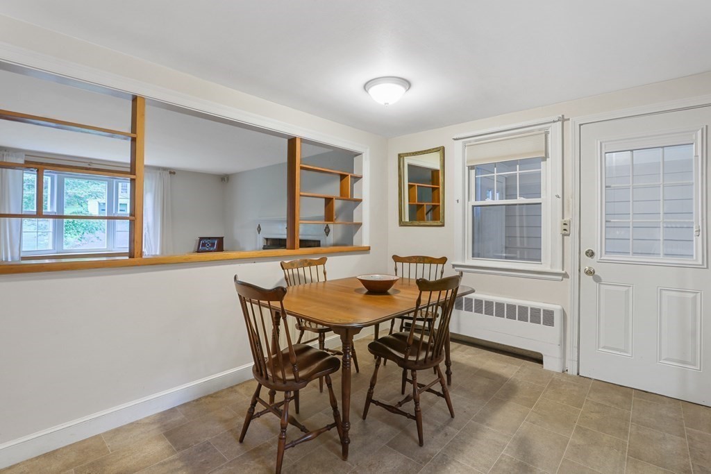 21 Cutler Drive Ashland, MA 01721 - Photo 7 of 34 a view of a dining room with furniture and window