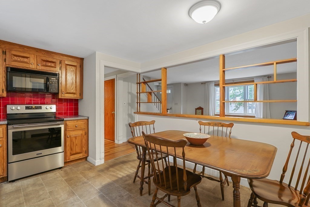 21 Cutler Drive Ashland, MA 01721 - Photo 8 of 34 a dining room with furniture and window