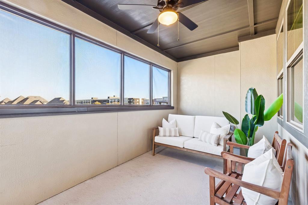 7119 Amber Grove Dallas, TX 75231 - Photo 27 of 30 a living room with furniture and a potted plant