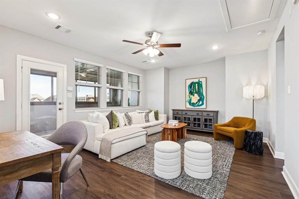 7119 Amber Grove Dallas, TX 75231 - Photo 6 of 30 a living room with furniture and a large window