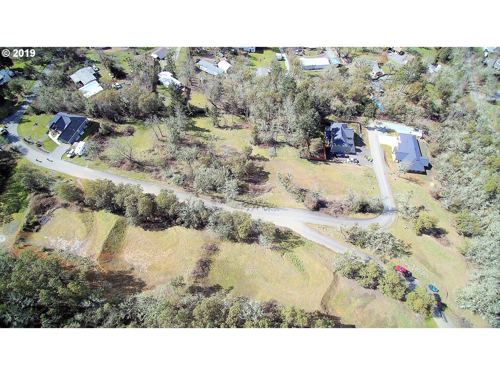 115 West Ridge Lane Myrtle Creek, OR 97457 - Photo 2 of 11 a view of a lake