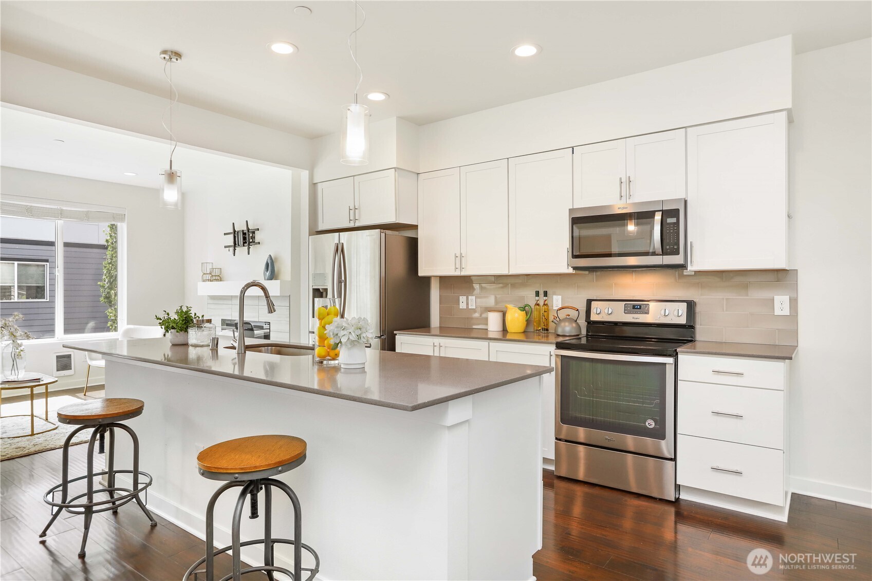 14913 48th Avenue West, Unit C4 Edmonds, WA 98026 - Photo 1 of 32 a kitchen with stainless steel appliances a stove refrigerator sink and microwave
