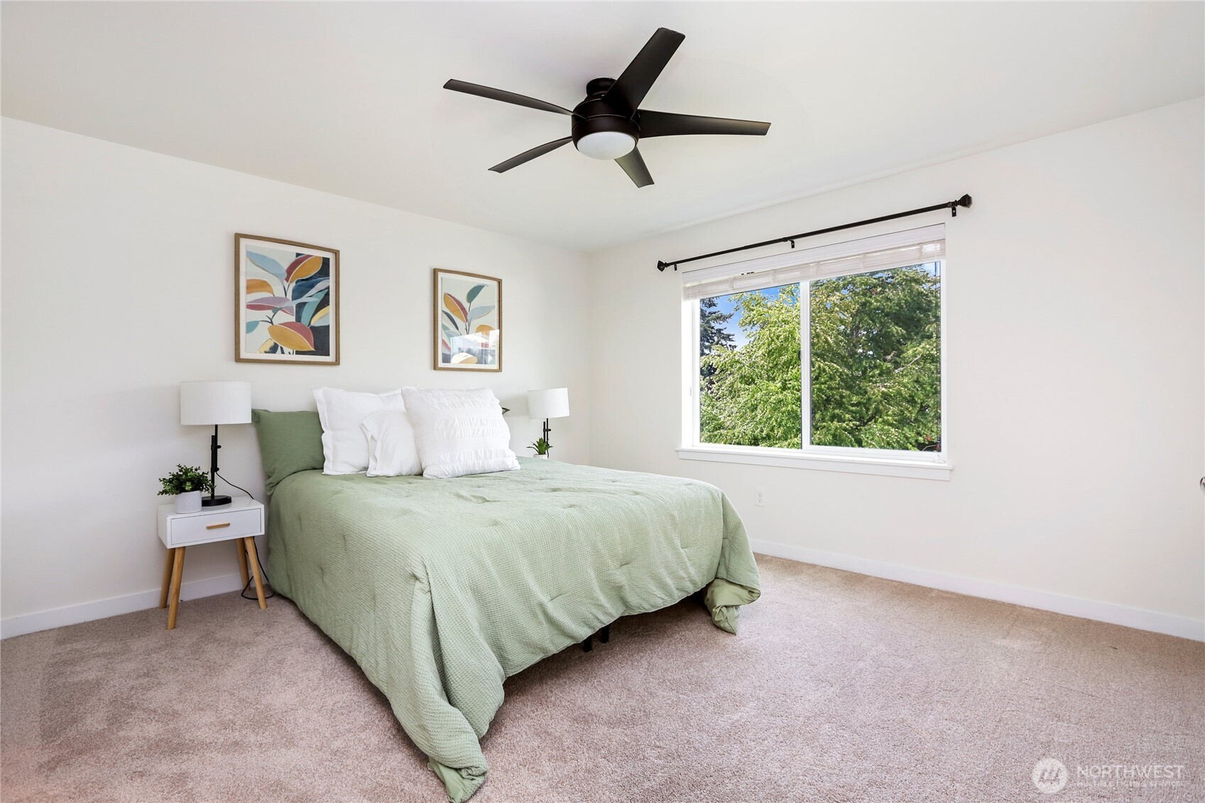 14913 48th Avenue West, Unit C4 Edmonds, WA 98026 - Photo 19 of 32 a spacious bedroom with a bed and a large window
