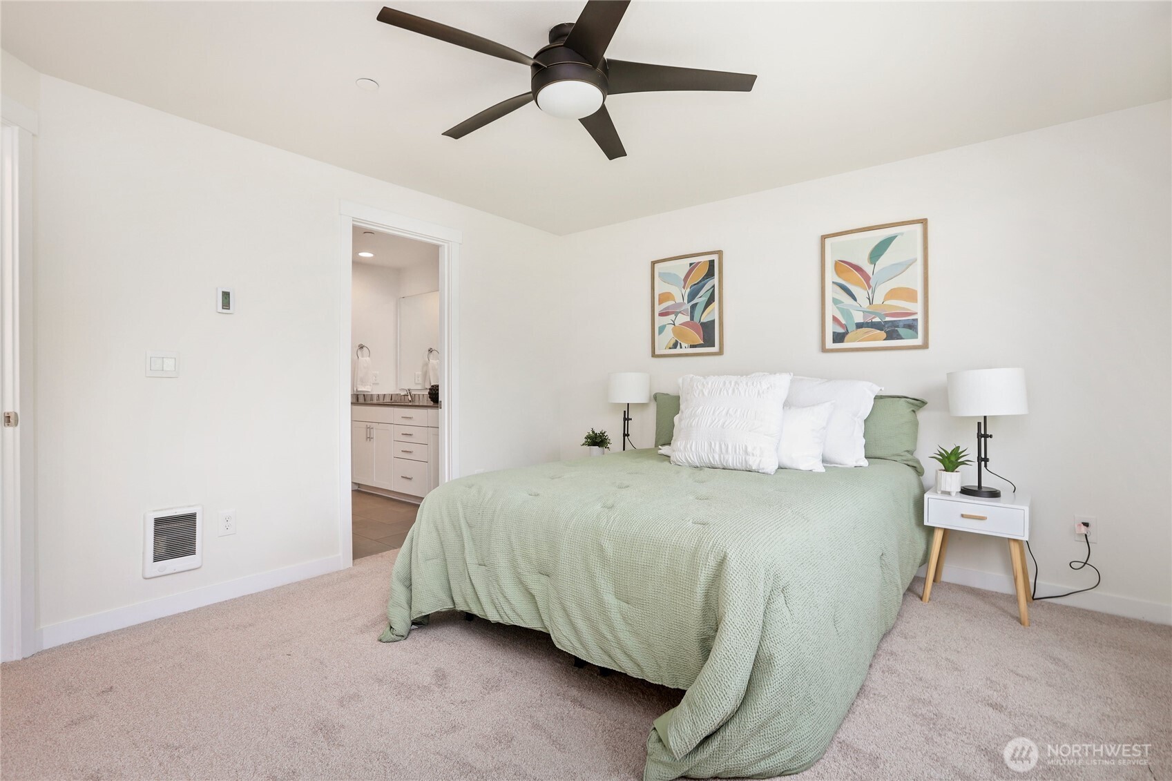 14913 48th Avenue West, Unit C4 Edmonds, WA 98026 - Photo 20 of 32 a spacious bedroom with a bed and cabinets