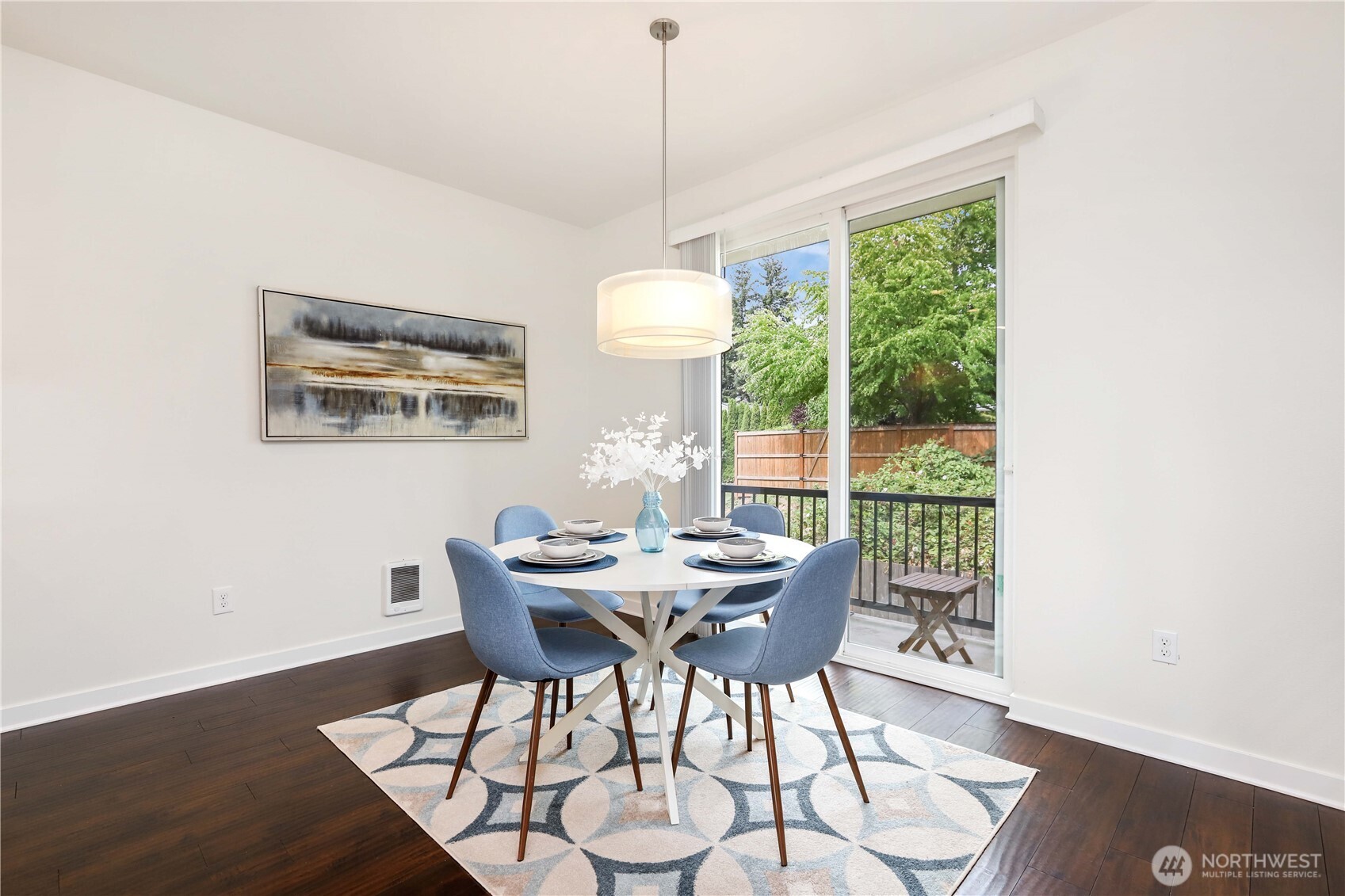 14913 48th Avenue West, Unit C4 Edmonds, WA 98026 - Photo 8 of 32 a dining room with furniture a chandelier and wooden floor