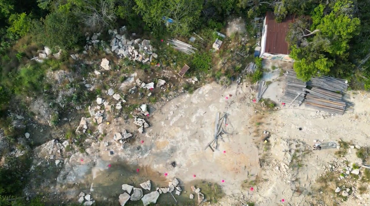 12015 Buckner Road Austin, TX 78726 - Photo 19 of 22 An aerial perspective reveals a raw lot, ready for development amidst natural surroundings.