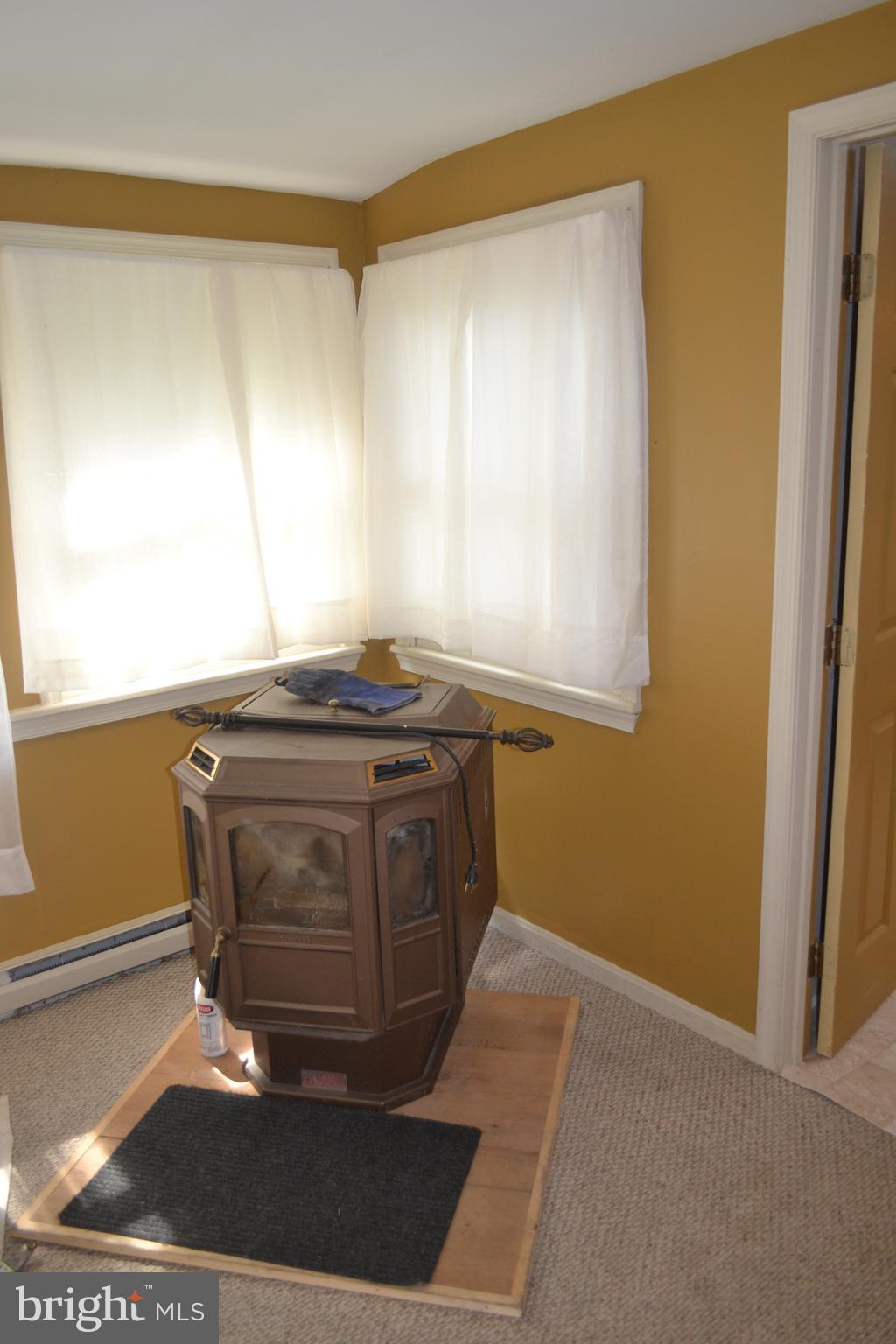 23261 Bush Neck Road Bozman, MD 21612 - Photo 16 of 27 The Pellet Stove will keep you toasty warm!