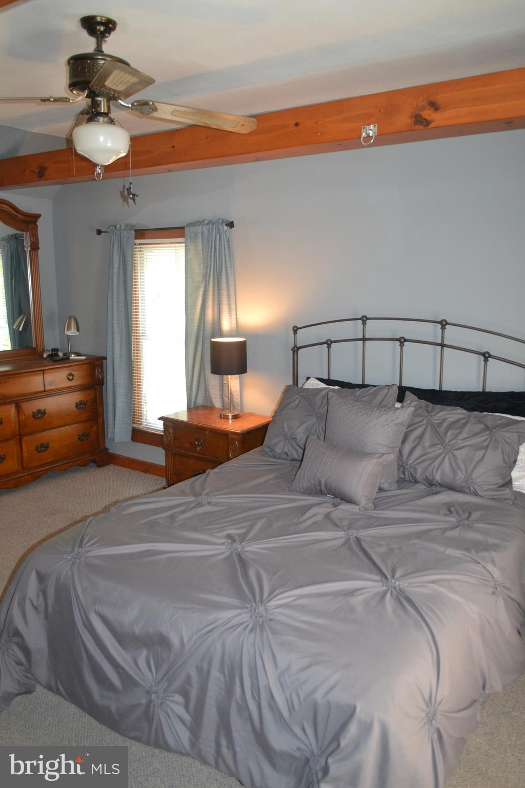 23261 Bush Neck Road Bozman, MD 21612 - Photo 17 of 27 Bedroom with beamed ceiling