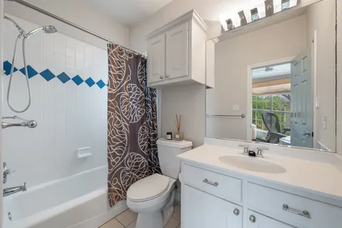 a bathroom with a sink a toilet and a bathtub