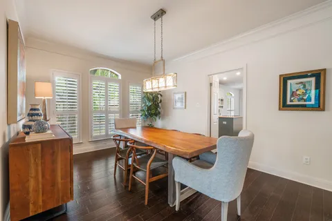 a dining room with furniture window wooden floor