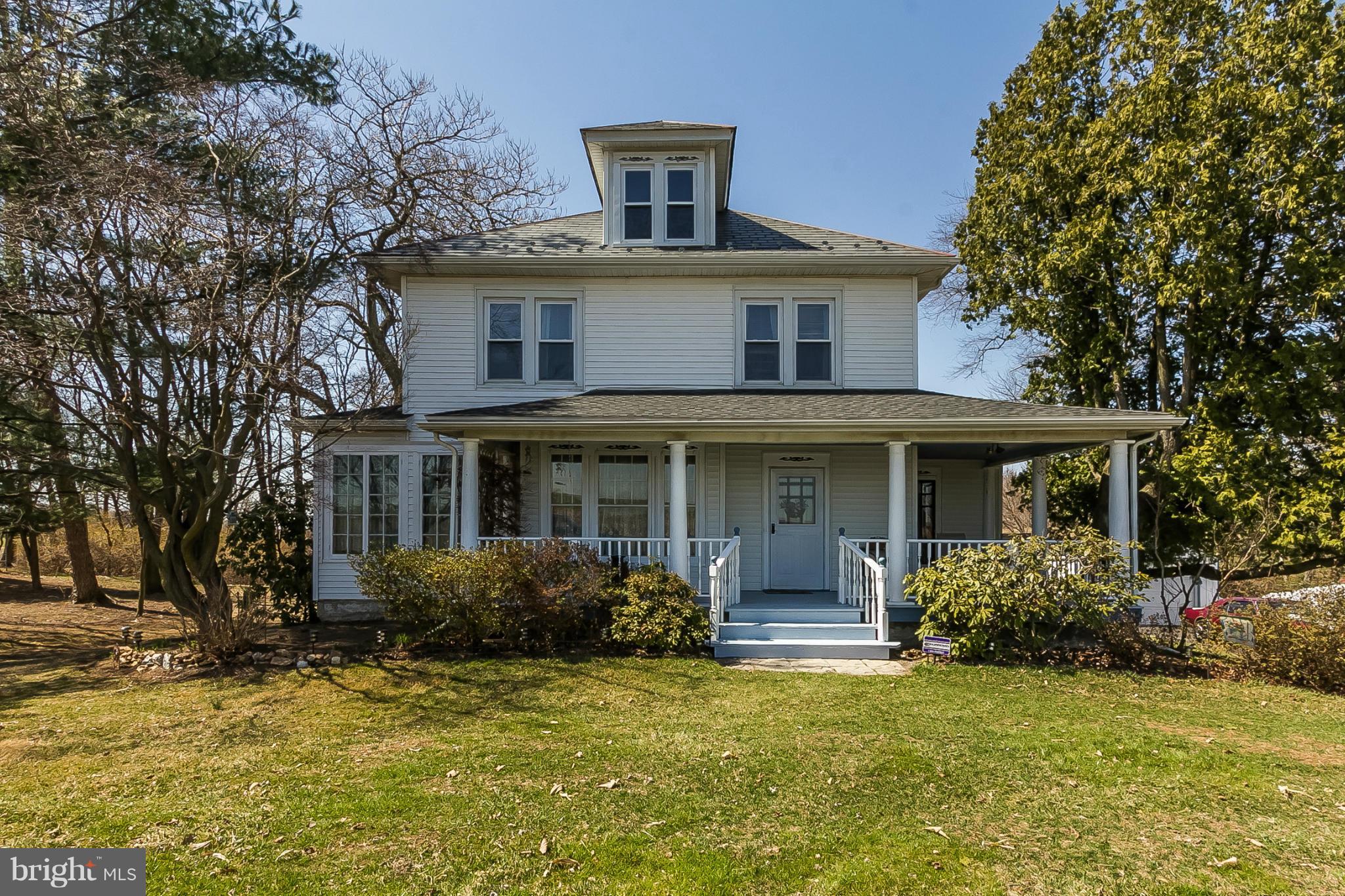 4524 Norrisville Road White Hall, MD 21161 - Photo 1 of 21 a front view of a house with garden