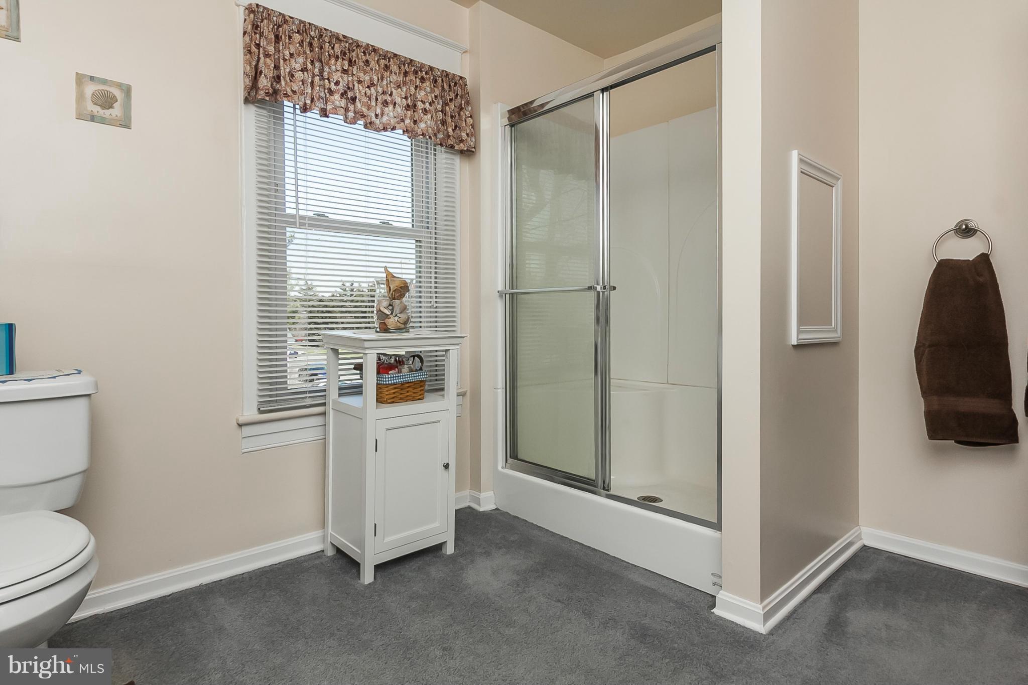 4524 Norrisville Road White Hall, MD 21161 - Photo 12 of 21 a bathroom with a shower and toilet