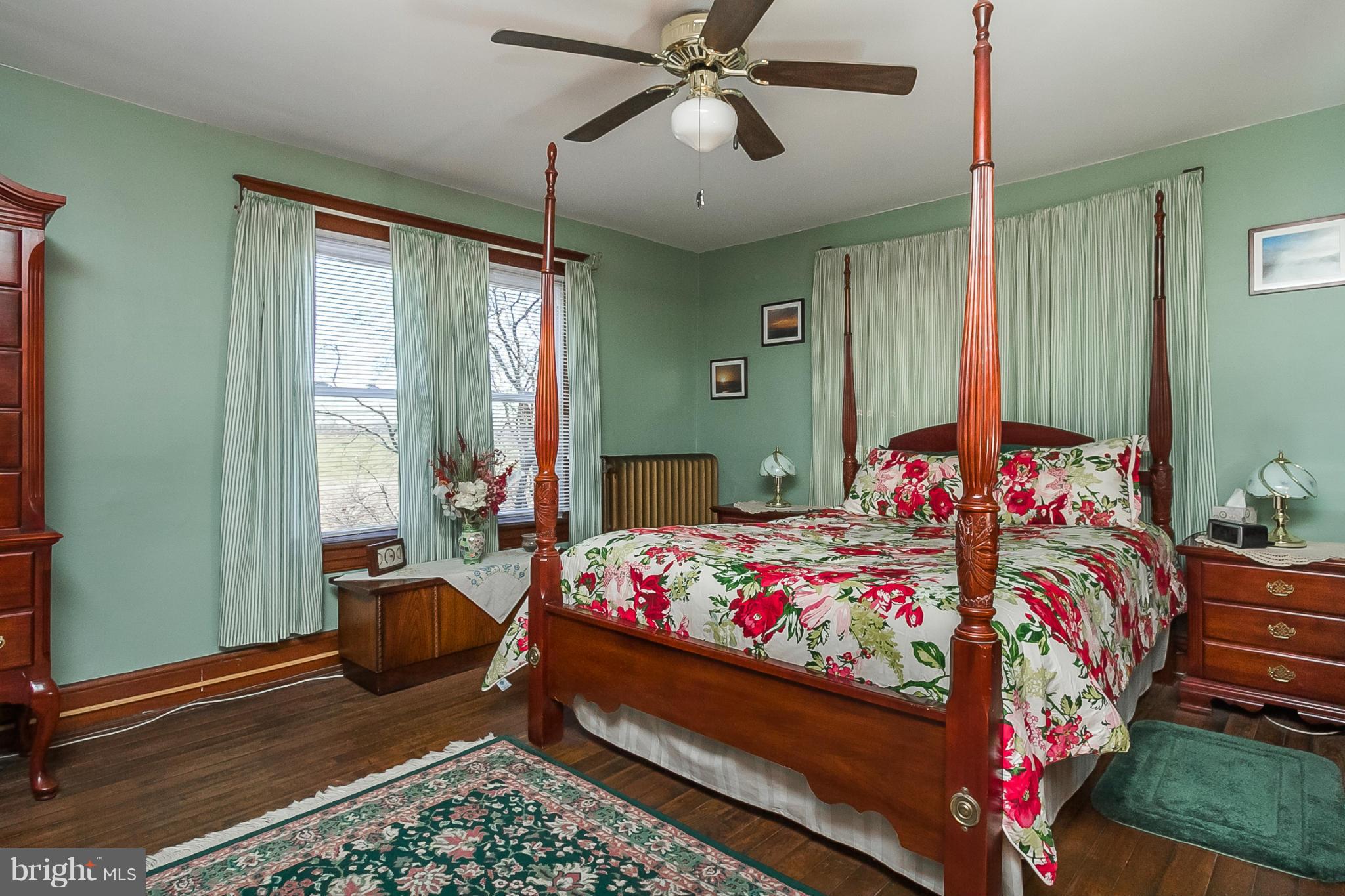 4524 Norrisville Road White Hall, MD 21161 - Photo 13 of 21 a bed room with a bed mirror and a window