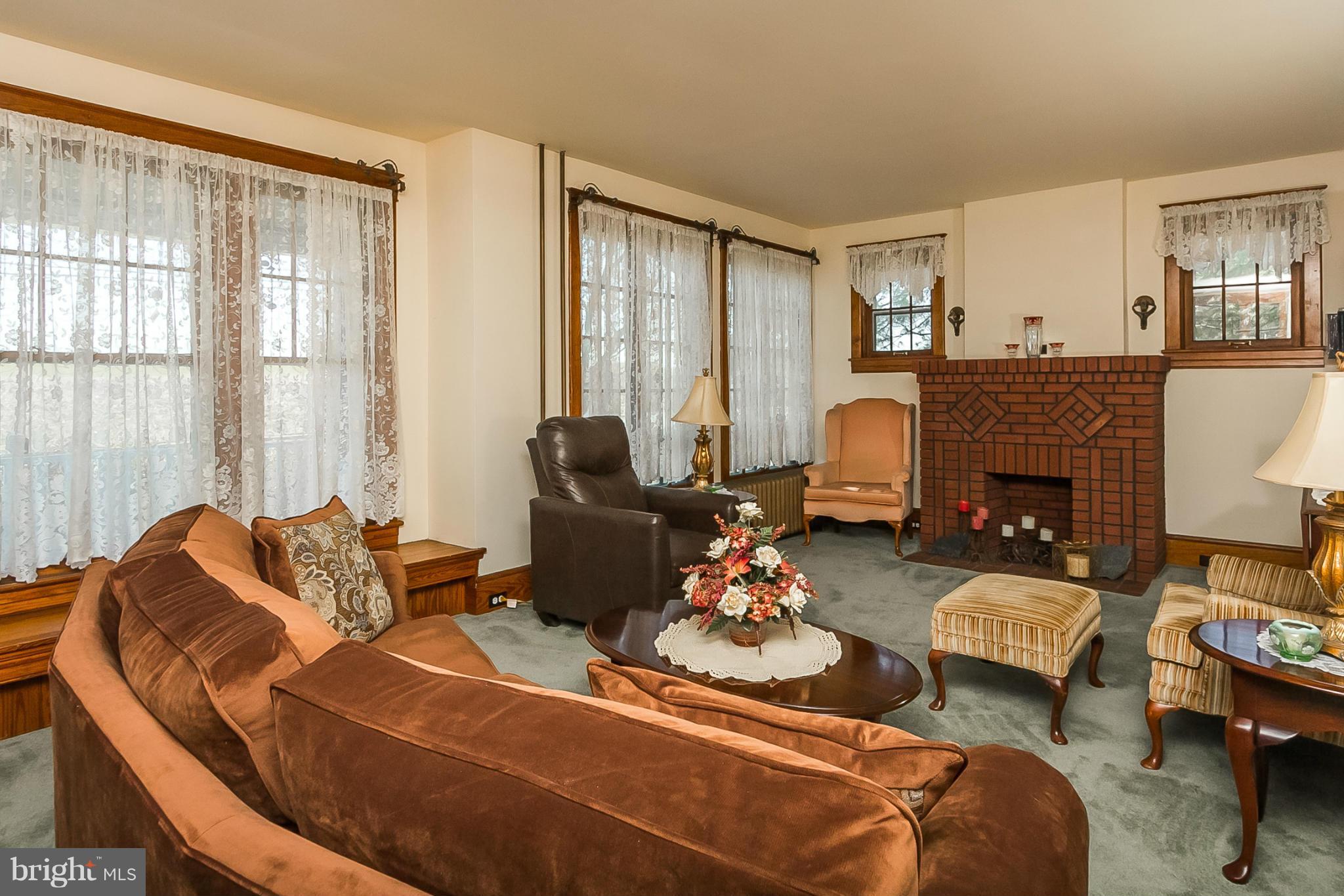 4524 Norrisville Road White Hall, MD 21161 - Photo 3 of 21 a living room with furniture fireplace and a large window
