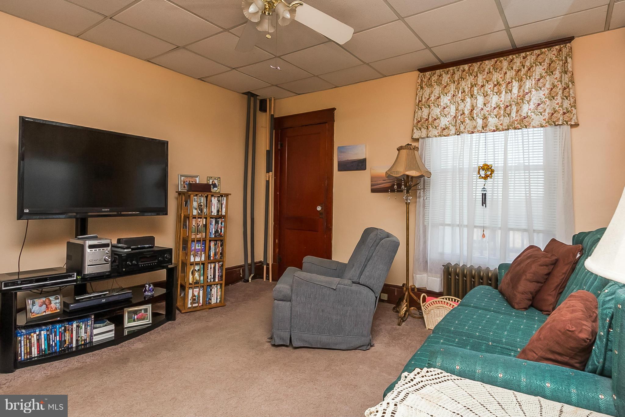 4524 Norrisville Road White Hall, MD 21161 - Photo 9 of 21 a living room with furniture and a flat screen tv