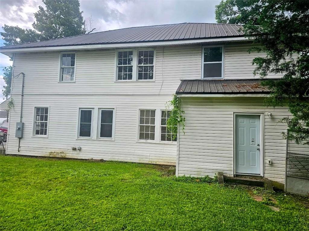 354 South Main Street Thomaston, GA 30286 - Photo 23 of 24 a front view of a house with a yard