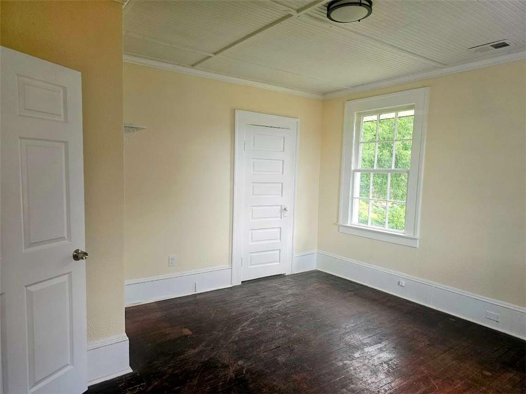 354 South Main Street Thomaston, GA 30286 - Photo 8 of 24 a view of a room that has a window in it