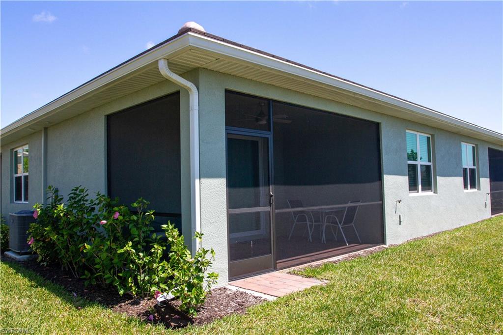 1241 Enbrook Loop Naples, FL 34114 - Photo 36 of 50 a house view with a backyard space
