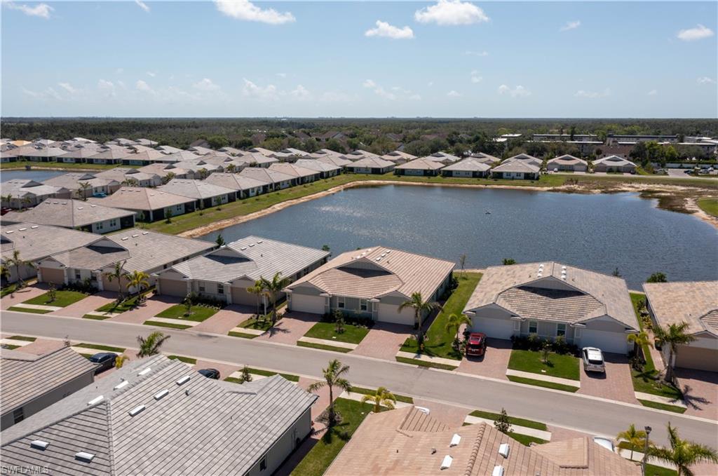 1241 Enbrook Loop Naples, FL 34114 - Photo 41 of 50 an aerial view of a house with a ocean view