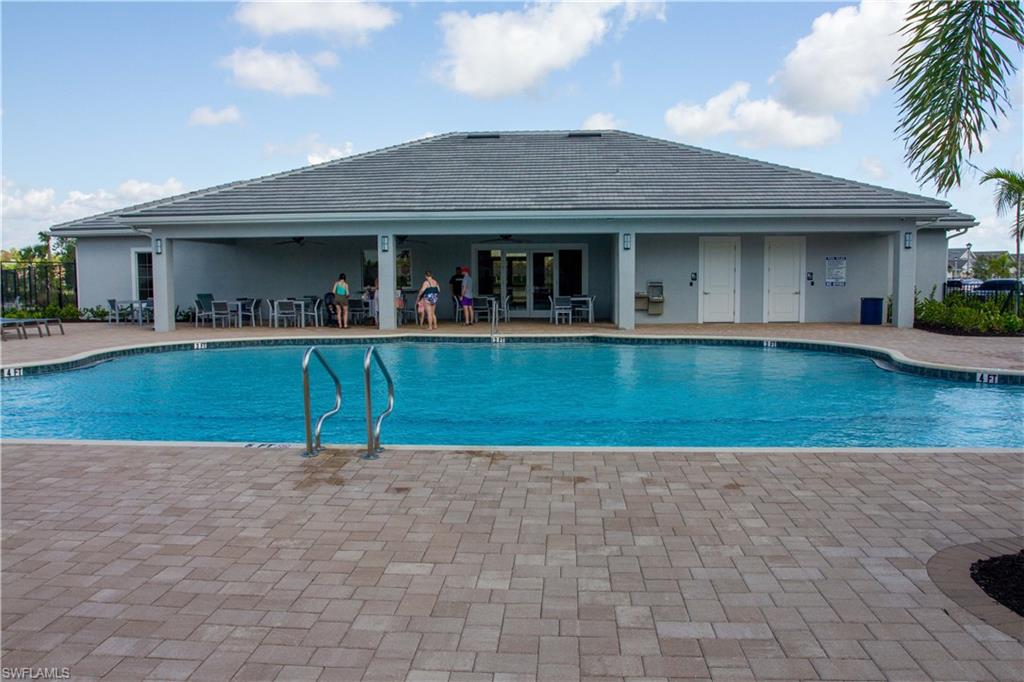 1241 Enbrook Loop Naples, FL 34114 - Photo 45 of 50 a view of a house with a yard