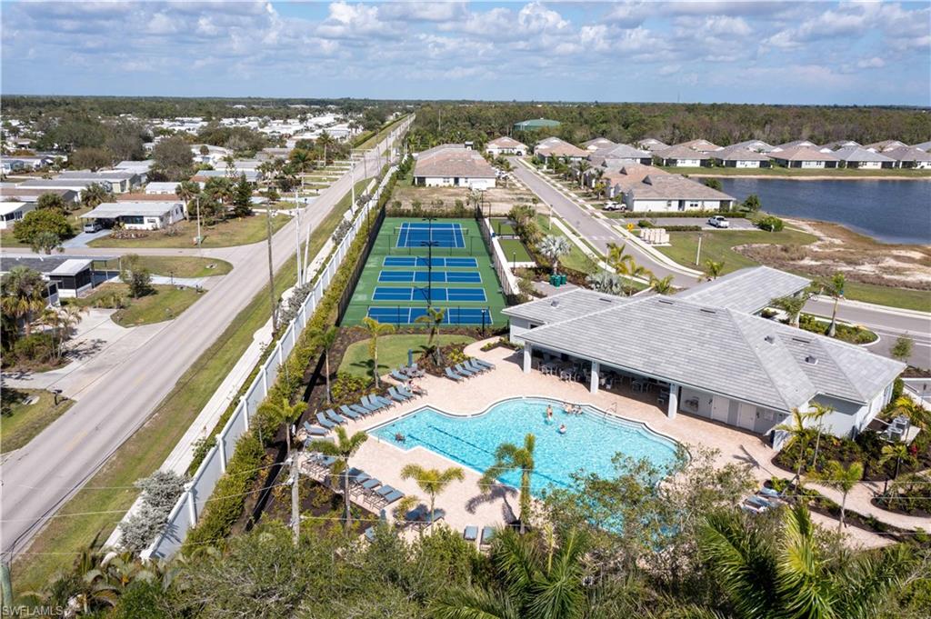 1241 Enbrook Loop Naples, FL 34114 - Photo 50 of 50 an aerial view of residential houses with outdoor space