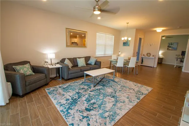 a living room with furniture and a couch