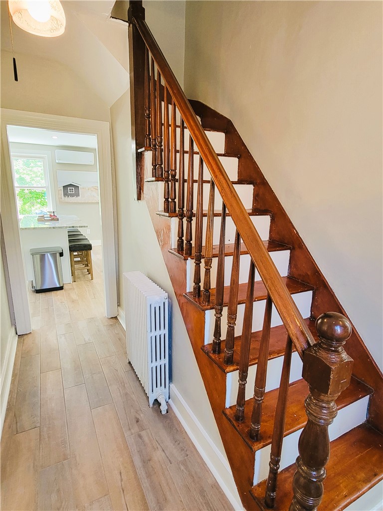 129 Connection Street Newport, RI 02840 - Photo 8 of 23 Foyer and entrance to dining, stairwell to 2nd floor