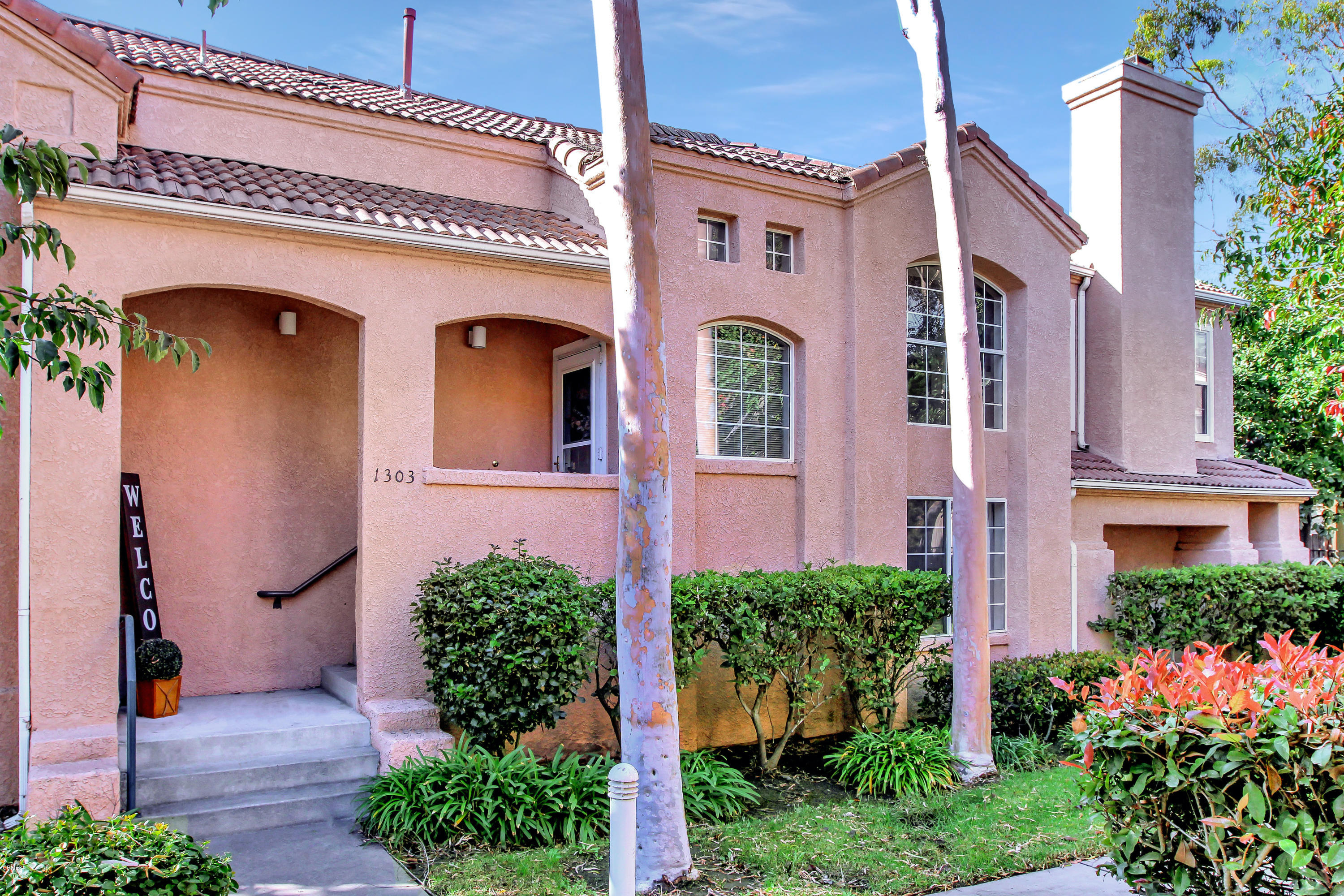 1303 Lost Point Lane Oxnard, CA 93030 - Photo 1 of 28 a front view of a house